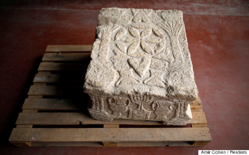 The Magdala Stone, one of the earliest known depictions of a Menorah, believed to be from the year 70 AD, is seen during a media tour presenting significant findings from the time of Jesus, at Israel's National Treasures Storeroom, in Beit Shemesh, Israel March 19, 2017. REUTERS/Amir Cohen